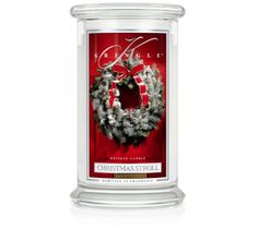 Kringle Candle Duża świeca zapachowa z dwoma knotami Christmas Stroll (623 g)